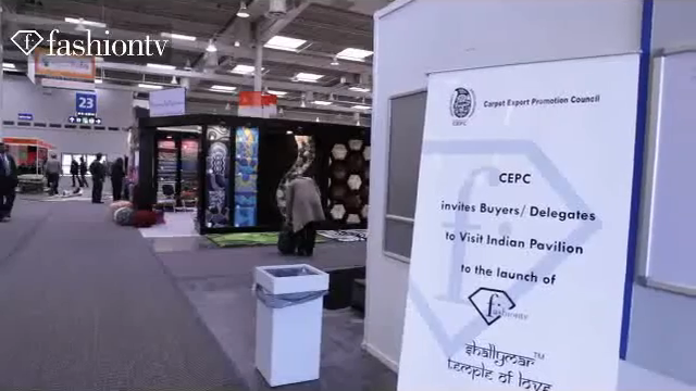The Carpet Export Promotion Council's sign at Domotex 2012, inviting buyers and delegates to the Indian Pavilion for the launch of Shallymar, temple of love